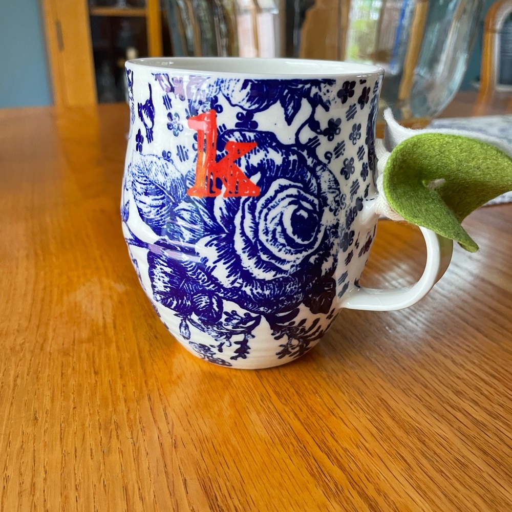 Anthropologie blue and white rose coffee/tea cup, letter K initial.